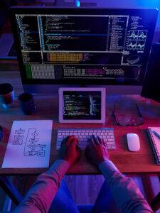top view unrecognizable hacker performing cyberattack night 1098 18706 225x300 - برنامه نویسی حرفه ای